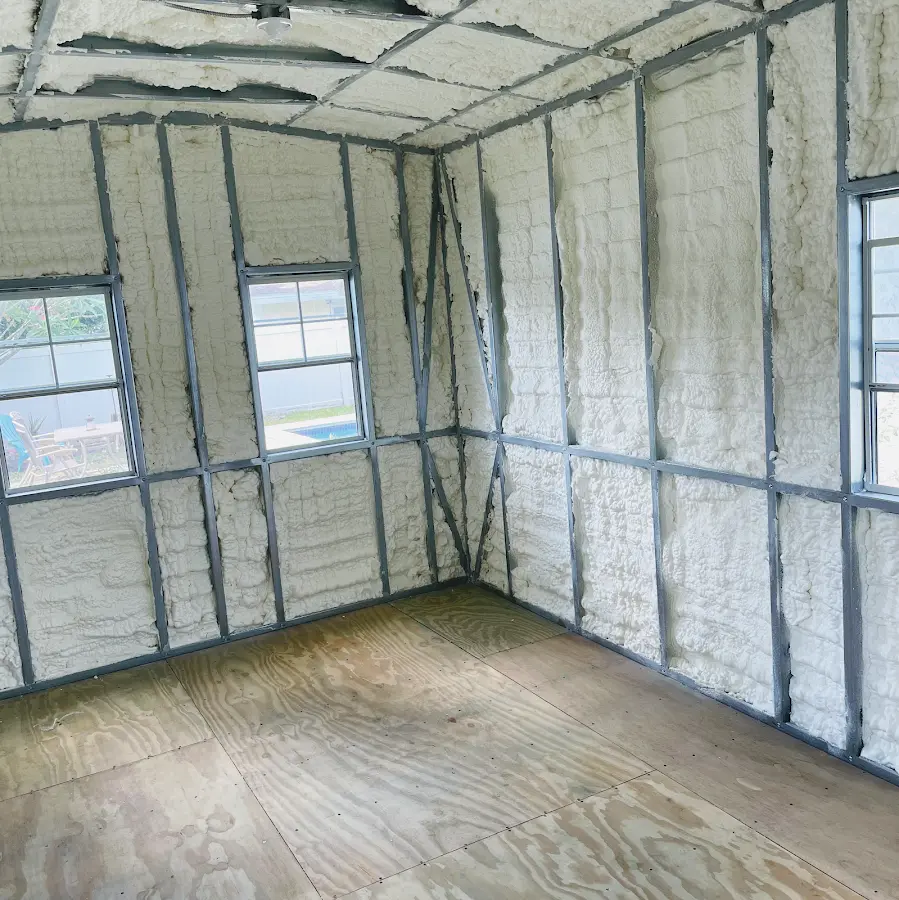 Closed-cell spray foam insulation applied to wall cavities in a residential project in Flowood